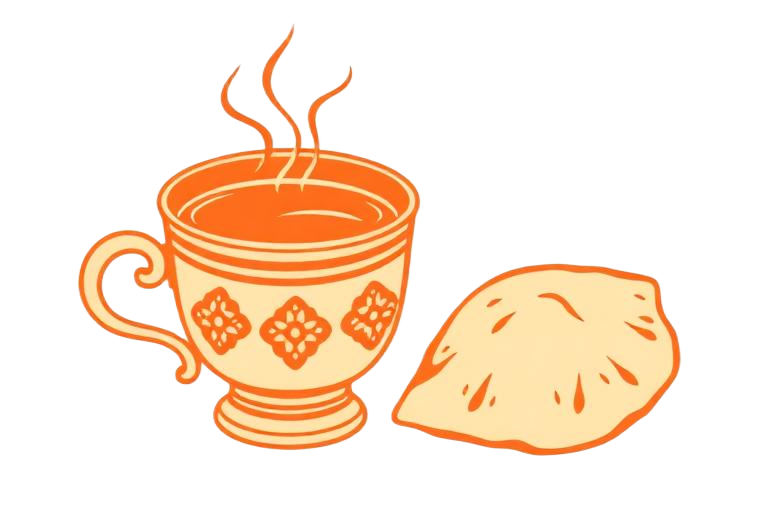 Cup of chai next to a khari puff